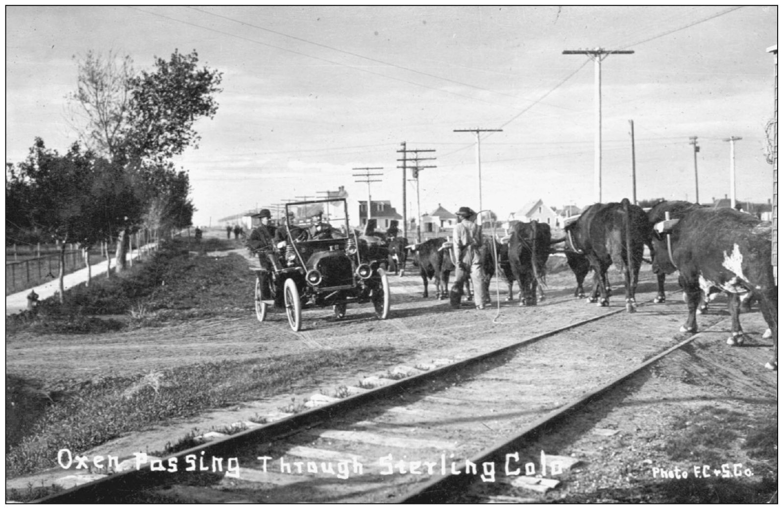 Three forms of transportation converge in this picture from 1909 as an - photo 13