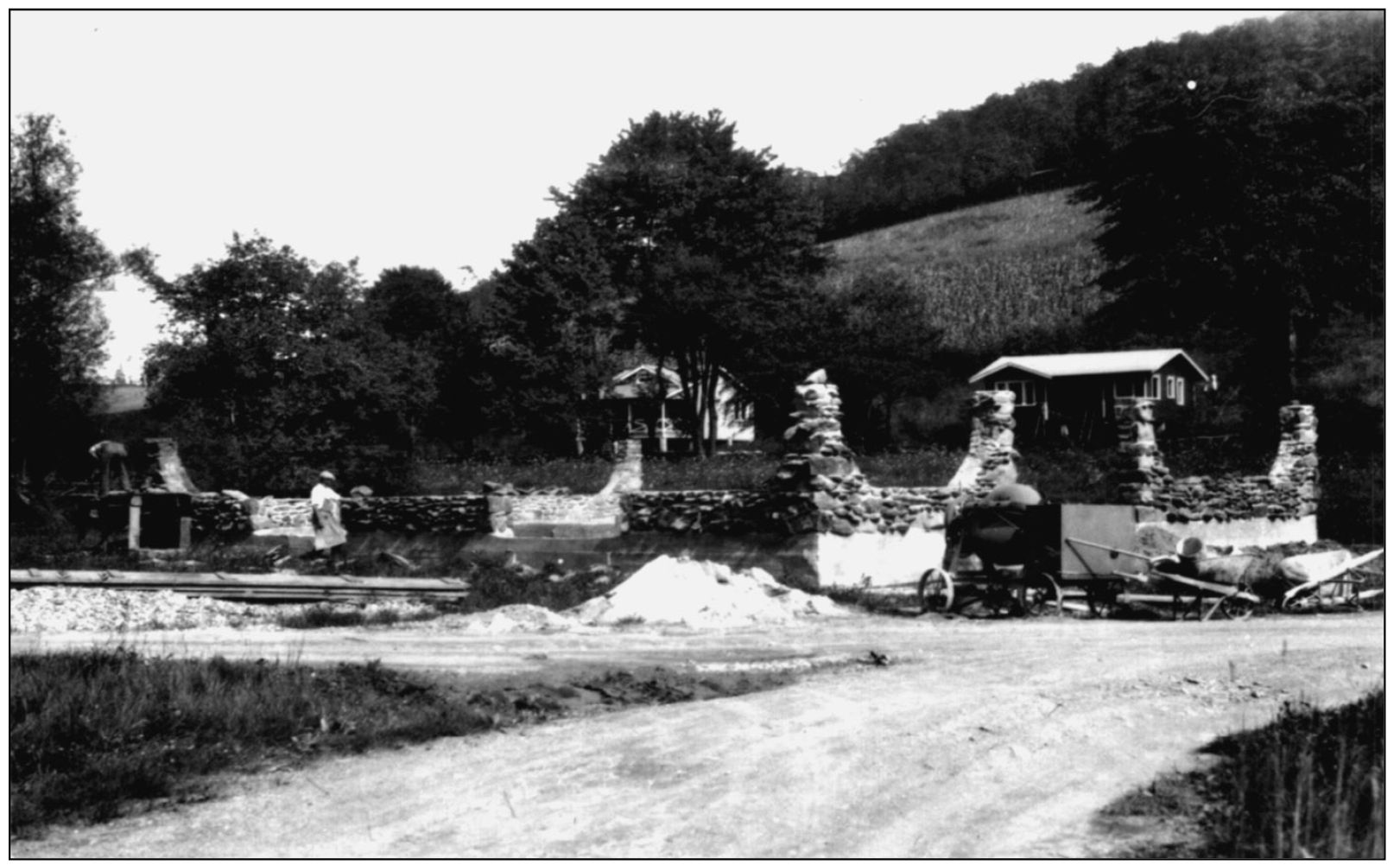 Some of the cottages and the dirt roads are visible behind the Trading Post - photo 4