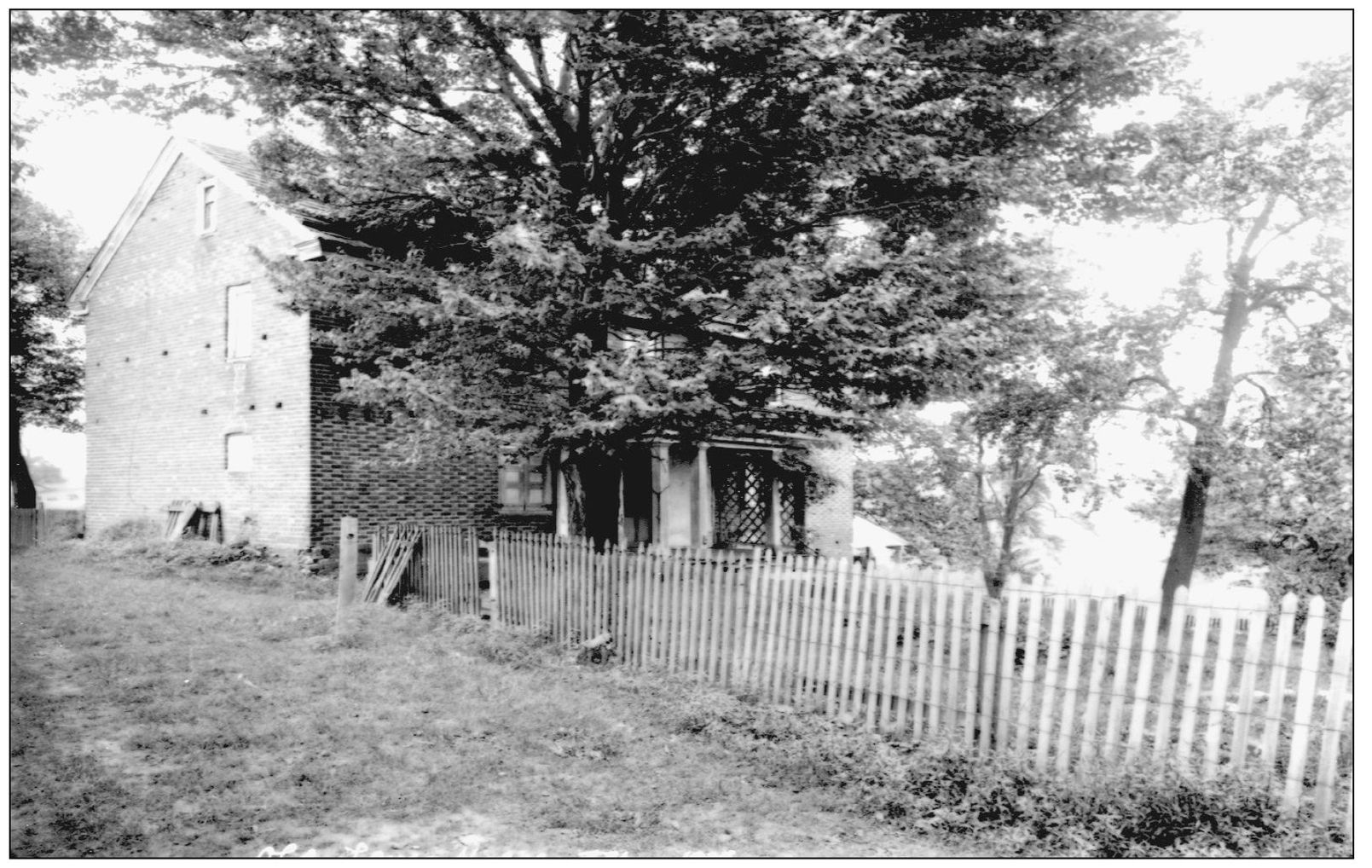 Samuel Levis built this red and black brick checkerboard-patterned home in the - photo 4