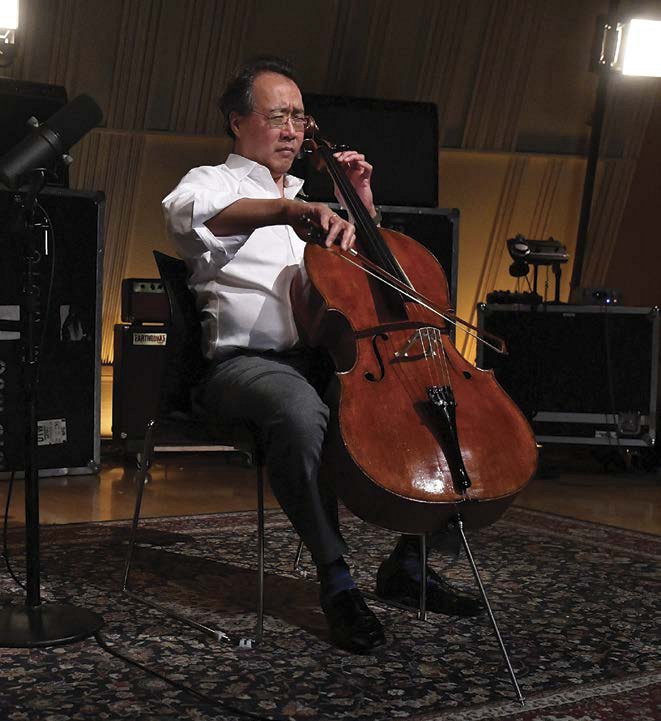 Yo-Yo Ma holds his cello between his legs Ma always knew he would be a - photo 3