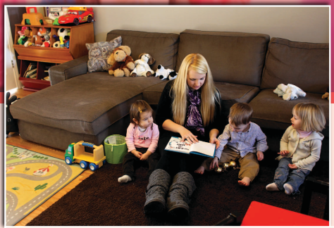 Sarah Simanskey runs a family child care center in her home Here she reads to - photo 5