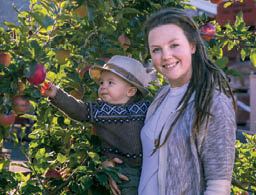 My son Landon and I picking apples at an orchard in Kelowna British Columbia - photo 1