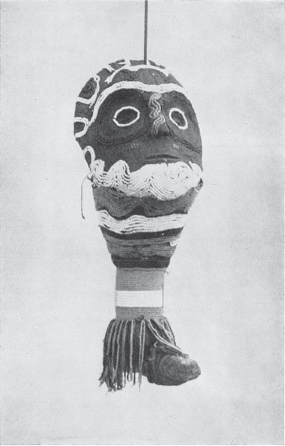 A carved model of a human head with bead decoration part of a diviners - photo 2