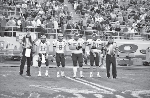 Piquas captains line up for the coin toss in 2011 Courtesy of Lee - photo 3