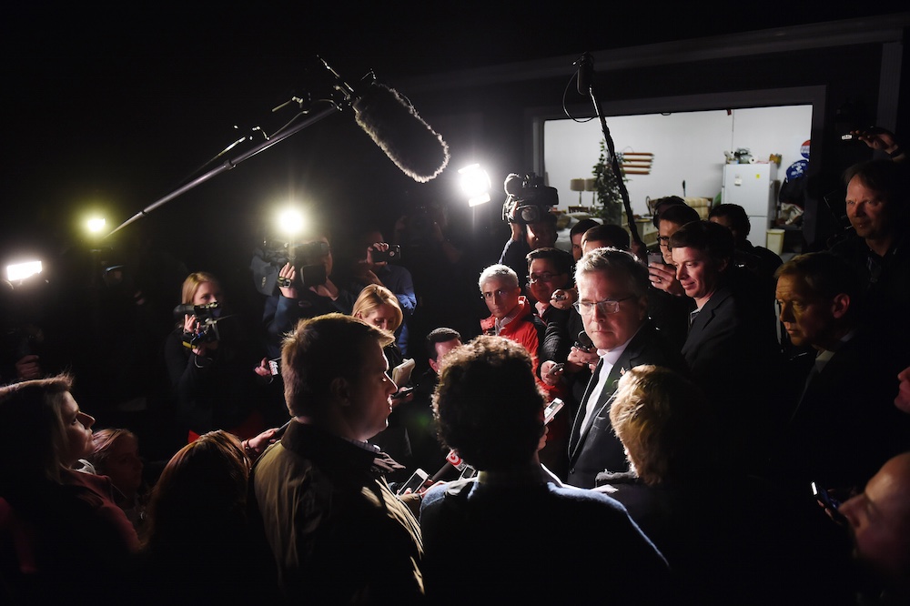 Jeb Bush talks to the media in March after a meet-and-greet event at a home of - photo 1