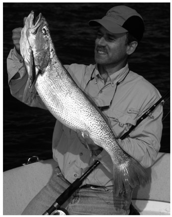 Photo credit Al Buchman The author poses with a trophy weakfish he caught - photo 2