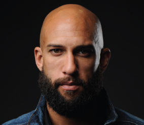 Courtesy of Everton Football Club TIM HOWARD is the goalkeeper for Everton in - photo 2