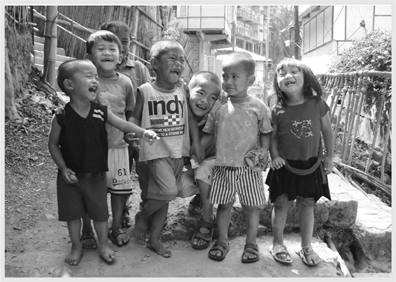 Outside a schoolhouse in northeast India these children couldnt contain their - photo 2