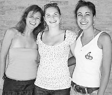 Amanda Knox center poses with Italian flatmates Filomena Romanelli left and - photo 4