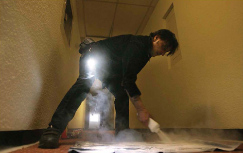 Paranormal investigators use talcum powder as a trap to capture evidence of - photo 5