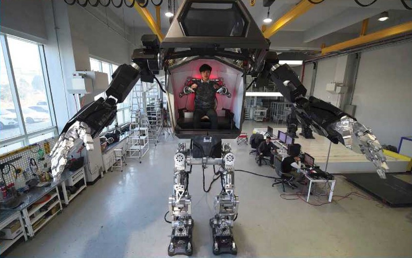 An engineer controls the 13-foot-tall 4 meter Method-2 robot at the Hankook - photo 4