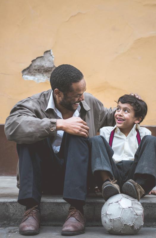 A six-year-old boy sitting next to his father suddenly asks him out of the - photo 1