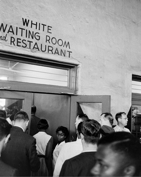 A group of Freedom Riders approaches a waiting room and restaurant marked for - photo 14