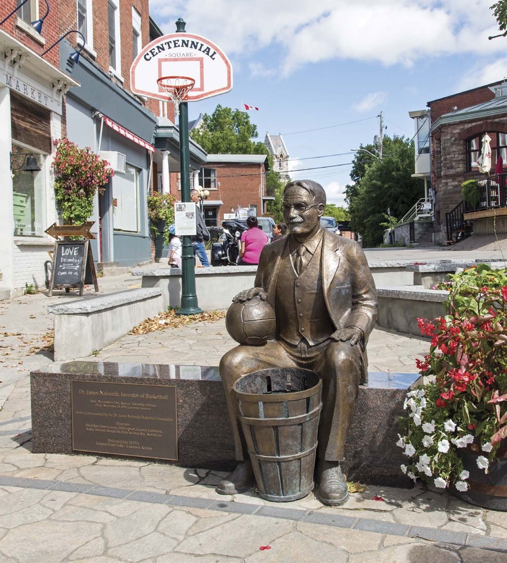 THERE IS A BRONZE STATUE OF JAMES NAISMITH IN A PARK IN HIS HOME TOWN OF - photo 2