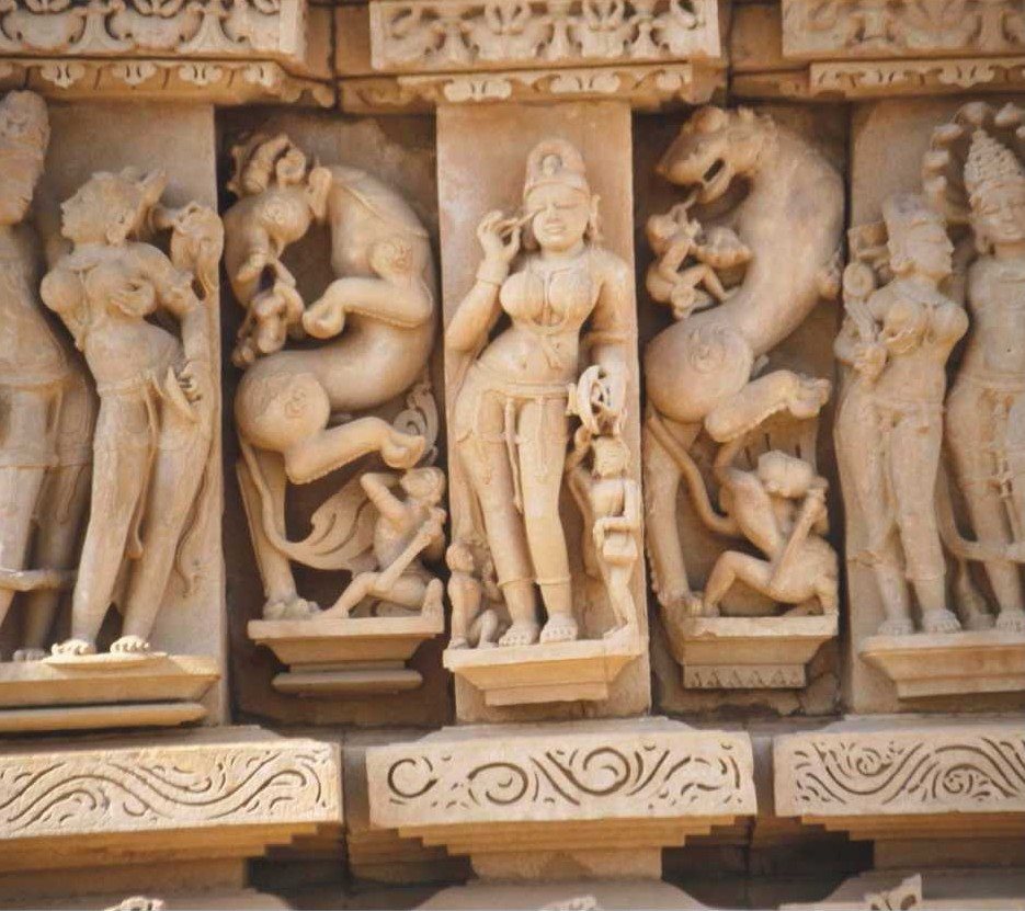 Sculpted figures of various gods decorate temples of the three main religions - photo 5