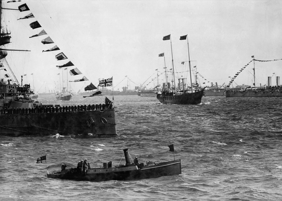 The royal yacht passing through the lines of warships during the Coronation - photo 3