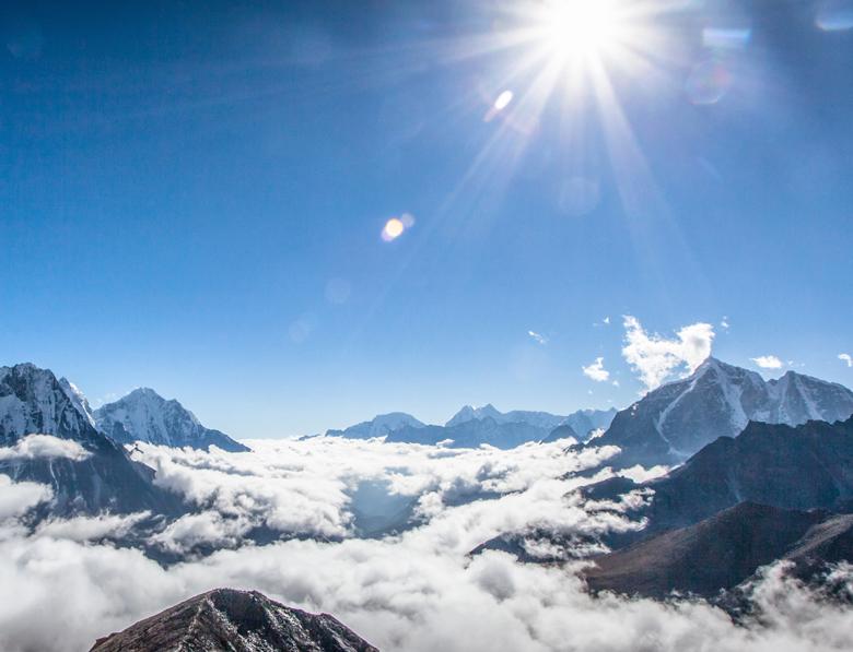 The view from Chukhung Ri with Ama Dablam poking up through the cloud on the - photo 1