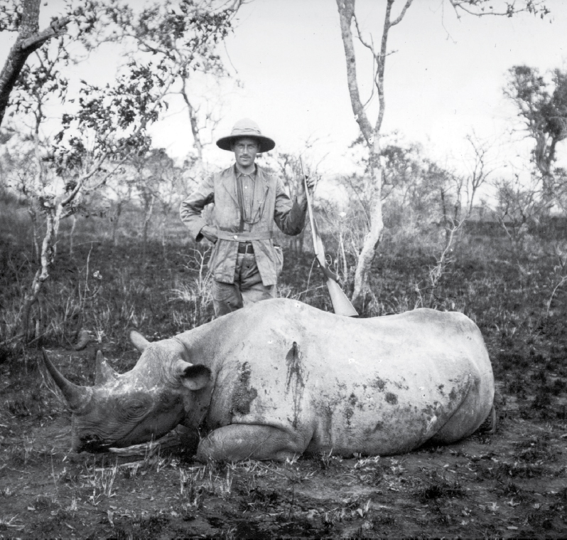 A hunter poses with a rhinoceros he killed around 1890 Efforts continue to - photo 2