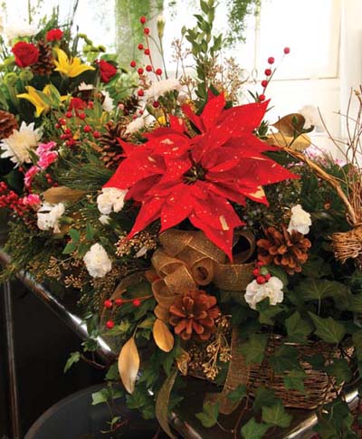 A beautiful Jingle Bell poinsettia blossoms next to other fresh greenery and - photo 5