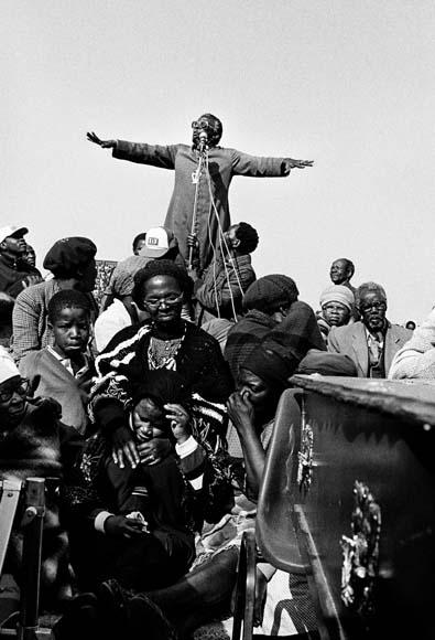 Tutu speaks at a mass funeral in KwaThema township near Johannesburg July - photo 2