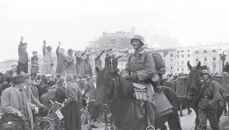 Austrians welcome German troops to Salzburg in 1938 as Hitlers forced union - photo 6