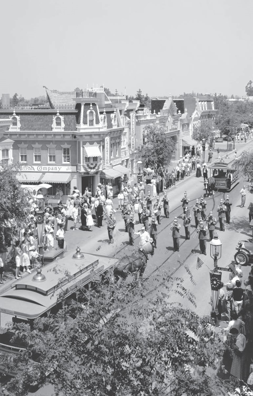 A marching band and horse-pulled streetcar head down Main Street USA - photo 16