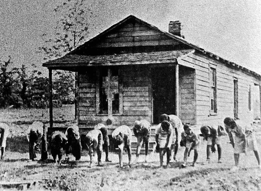 African-American children clean the grounds of their school in 1896 after - photo 4