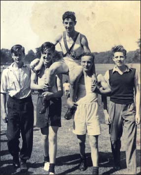 On a high thats me being held aloft after sports success during my schooldays - photo 2
