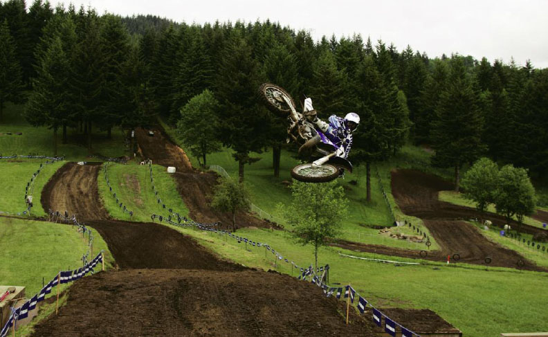 A racer takes advantage of an empty motocross course to fine tune his skills - photo 7