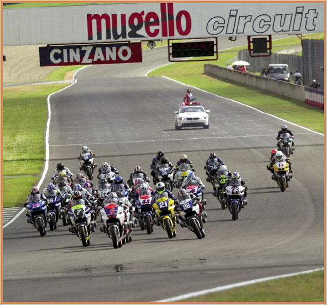 Sticky tires grip the pavement as racers lean into the curves ON THE STRIP - photo 12