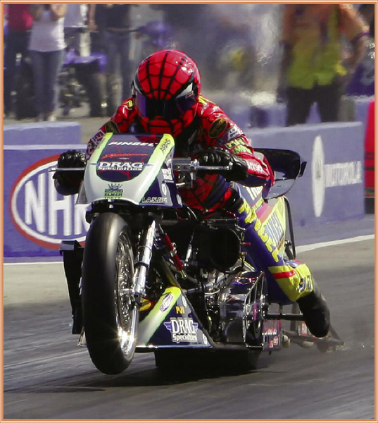 A wheelie bar at the rear of the bike keeps it from flipping during fast - photo 9