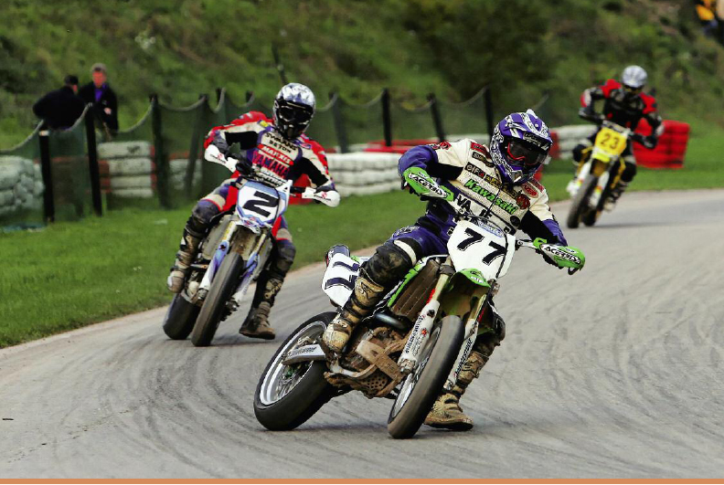 Supermoto racers use their inside foot for balance and control Supermoto - photo 15