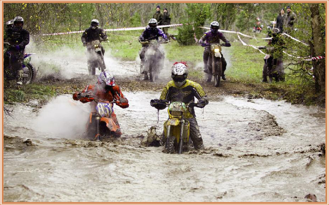 Enduro racers plow through mud pits on their way to the next checkpoint - photo 18