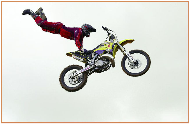 A rider nails the Superman Seat Grab Travis Pastrana executes a flawless - photo 11