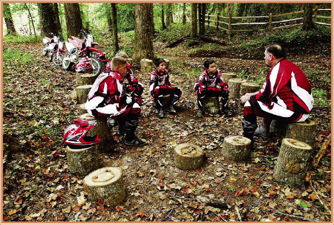 An instructor discusses the importance of safety with a group of new riders - photo 17