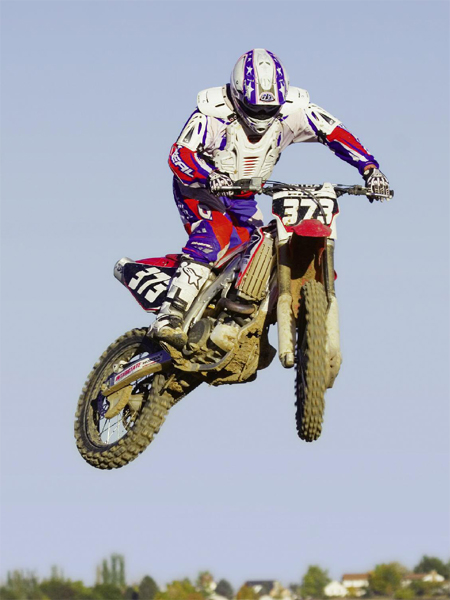 A motocross racer wears extra armor on his chest and shoulders GLOVES AND - photo 9