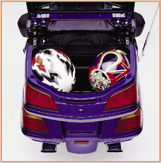 A large rear luggage compartment can hold two helmets and has a little extra - photo 15