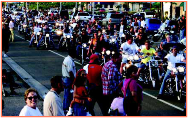 Bikers show off their rides in a motorcycle rally parade Choppers have become - photo 13