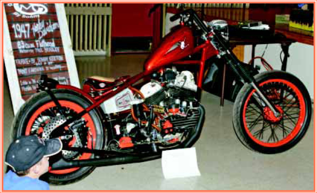 A young admirer checks out a customized 1947 Harley Davidson Choppers have - photo 3