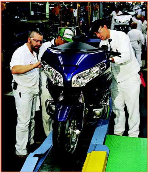 A Honda touring bike on the production line Big heavy touring bikes give a - photo 5