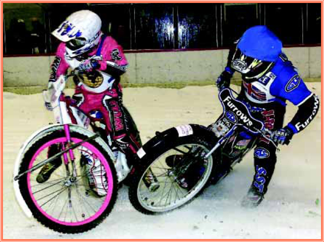 Riders collide during the last heat of the meet Ice heats are similar to - photo 8