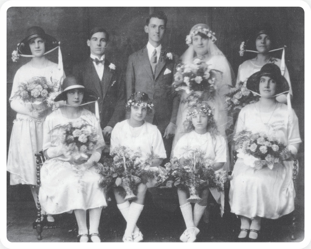 My mother at her sister Doriss wedding sitting on the front row the second on - photo 4