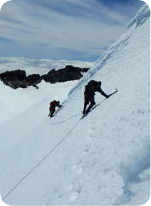Alan L and Robert R negotiating the icy traverse coming off the summit of - photo 5