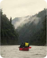 Passing a Canadian kayak as we paddle through the mist covered gorges of the - photo 6