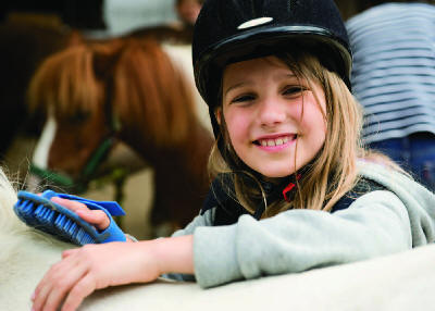 ABOVE Kids who have horses learn about compassion and responsibility at an - photo 4