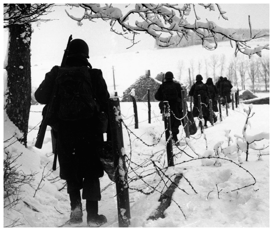 Facing title page 3rd Infantry Division soldiers moving toward a Belgian - photo 2