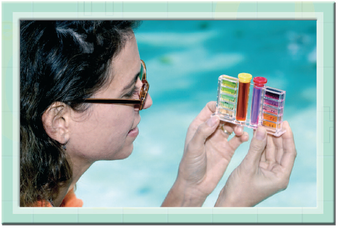 This woman is testing the chlorine levels in a public swimming pool Chlorine - photo 4