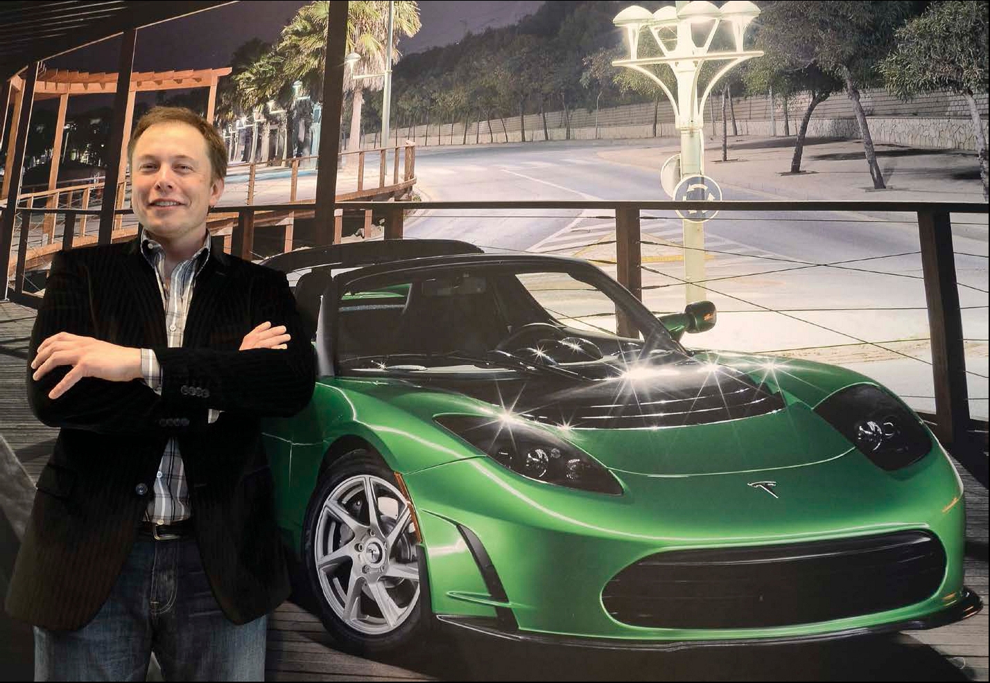 Elon poses with one of his Tesla Roadsters The first Roadster was introduced - photo 9