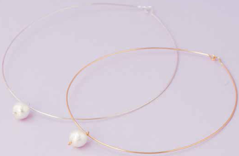 With its single pearl this elegant choker is a study in minimalist design - photo 10