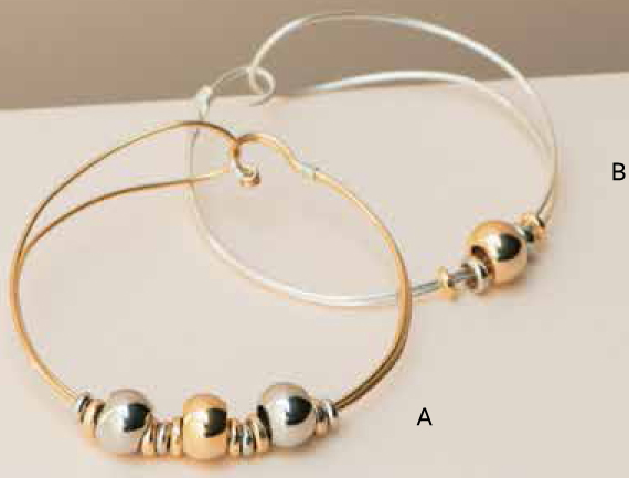 Mixed metals and beads of varying sizes combine to create this chic bangle The - photo 11